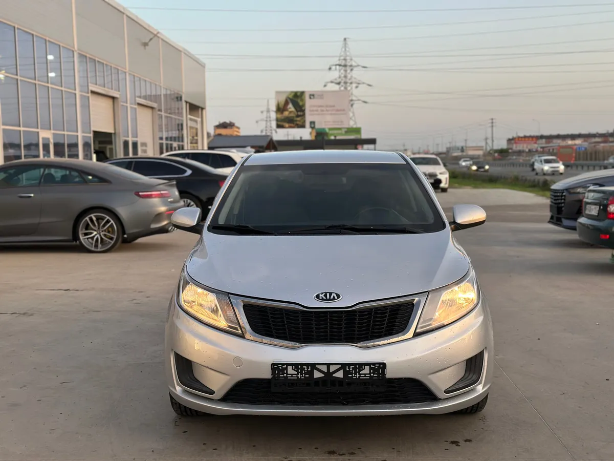 Kia Rio 1.4 AT (107 л.с.), 2014 — фото 5