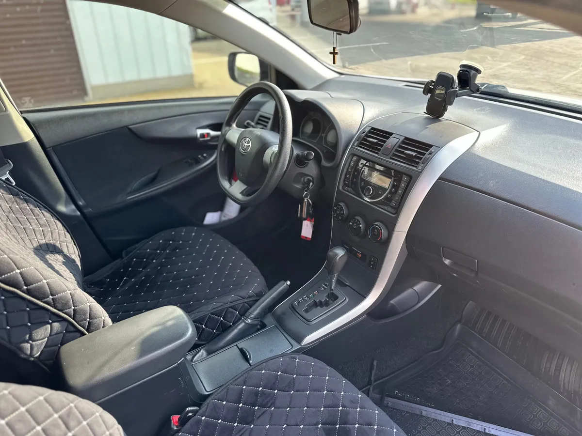 Toyota Corolla 1.6 AT (124 л.с.)