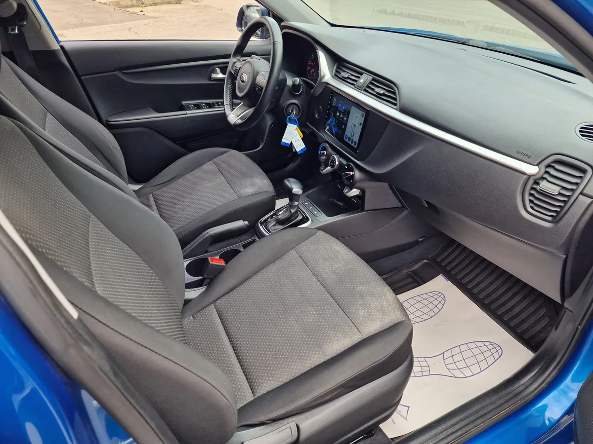 Kia Rio 1.6 AT (123 л.с.)