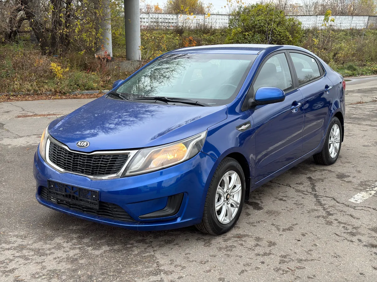 Kia Rio 1.4 AT (107 л.с.), 2014 — фото 2