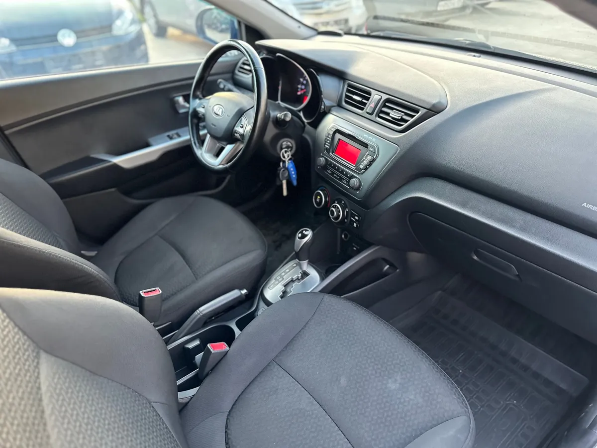 Kia Rio 1.4 AT (107 л.с.), 2014 — фото 8