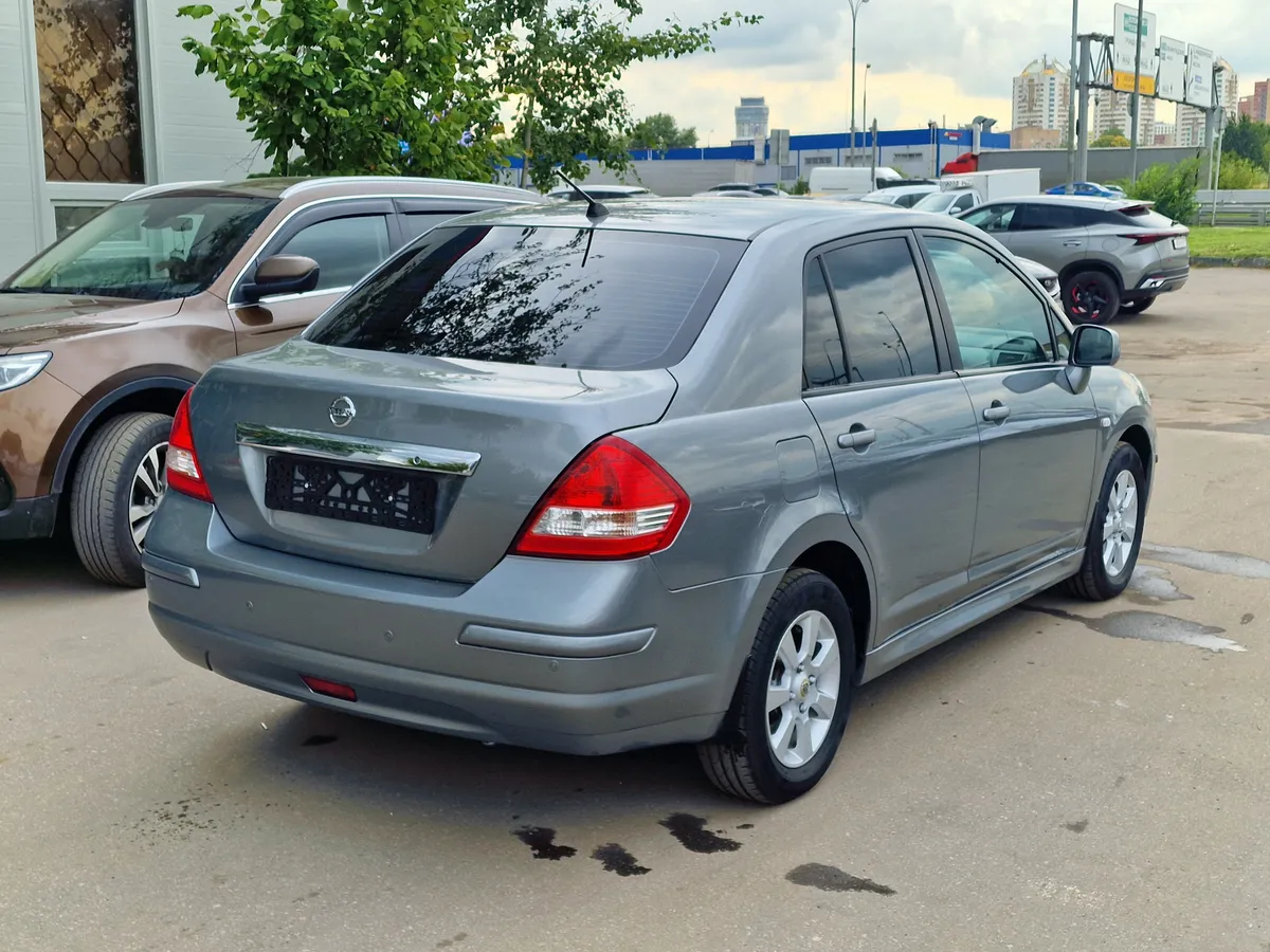 Nissan Tiida 1.6 AT (110 л.с.)