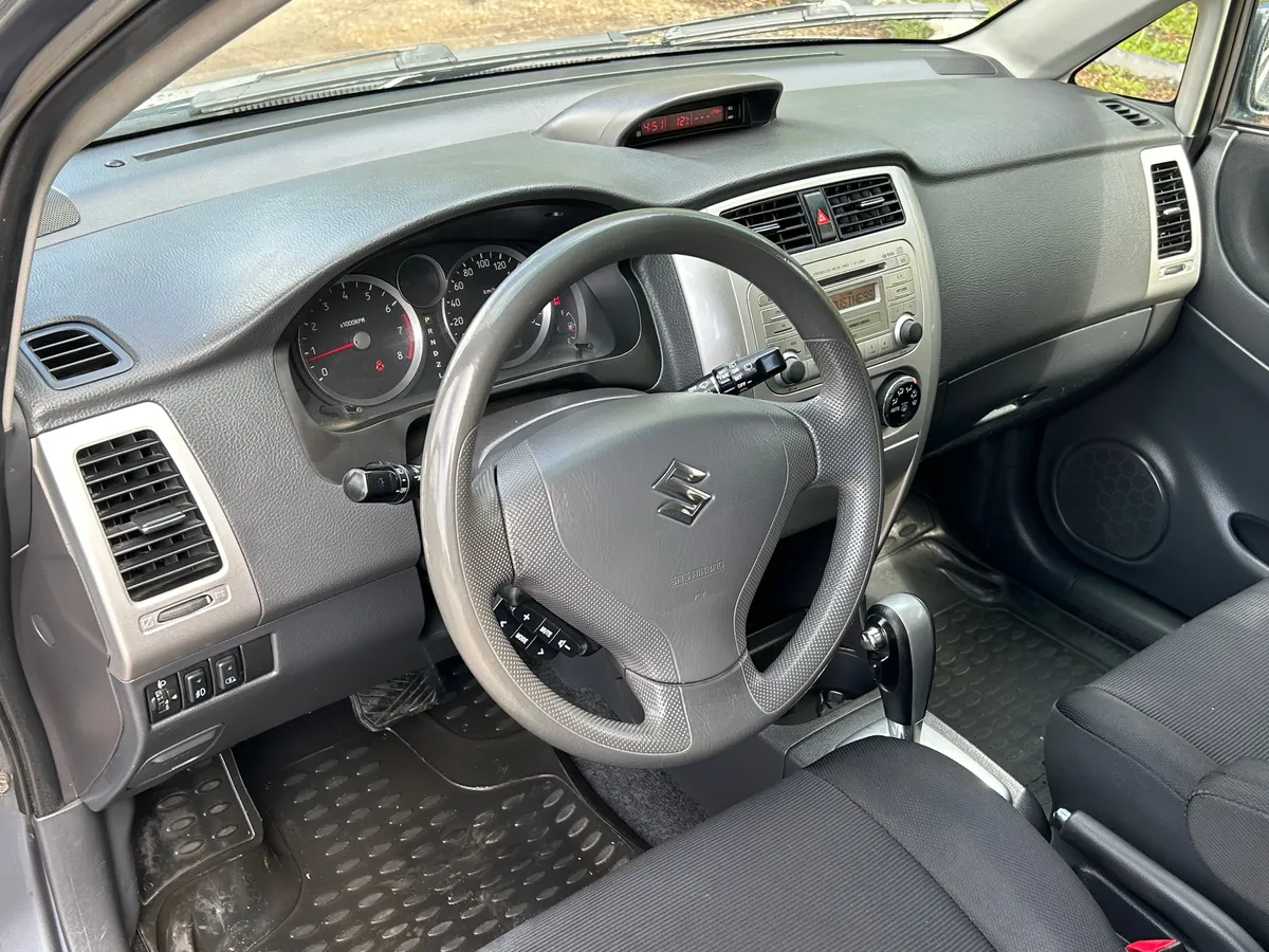Suzuki Liana 1.6 AT 4WD (106 л.с.)