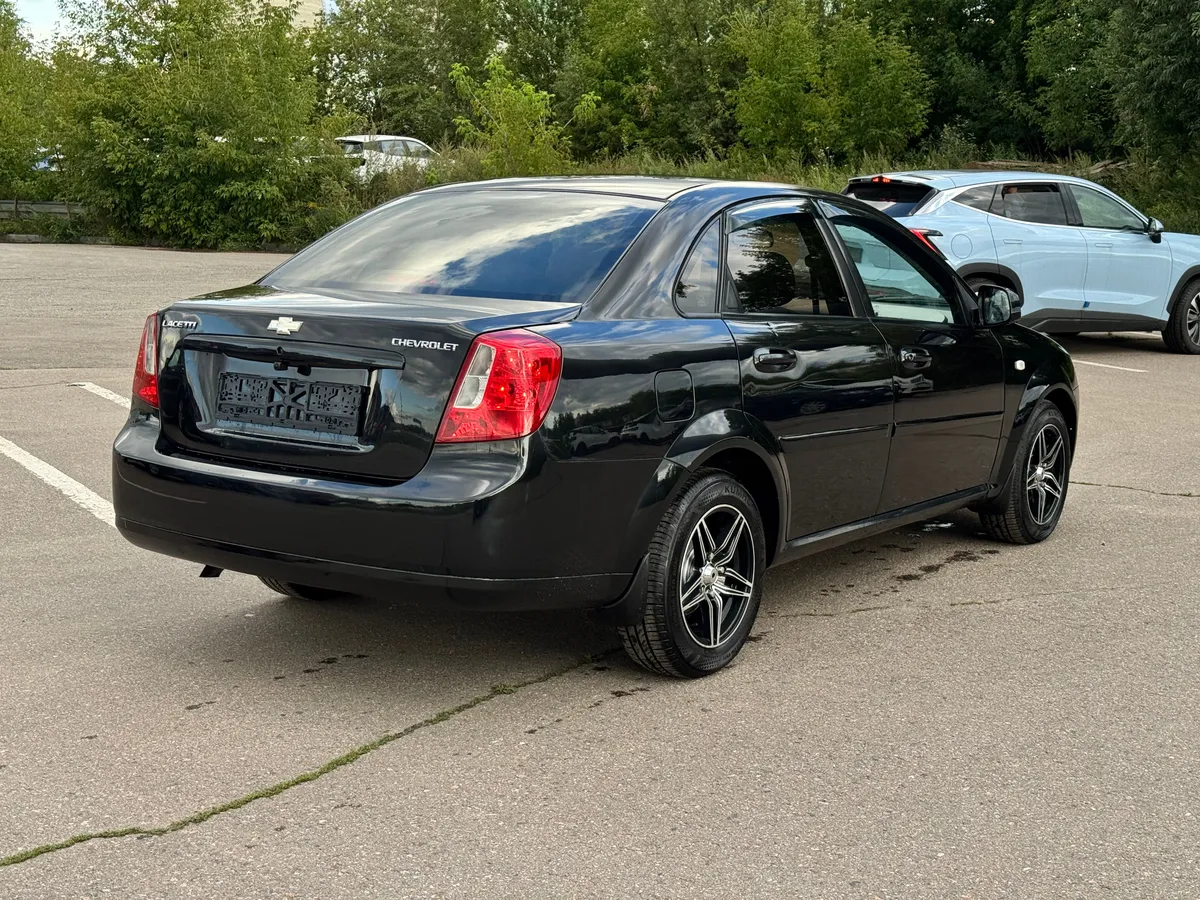 Chevrolet Lacetti 1.4 MT (95 л.с.)