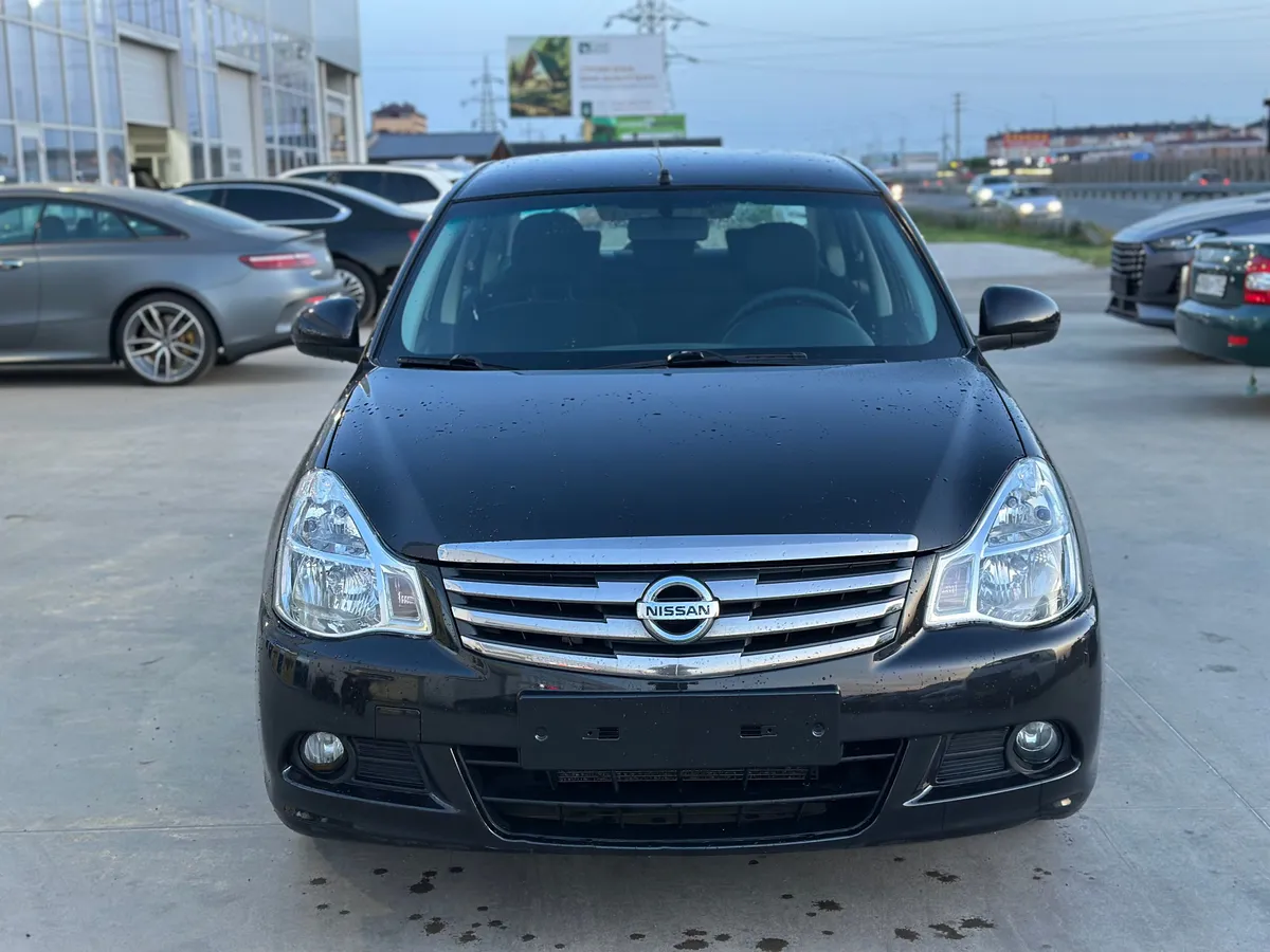 Nissan Almera 1.6 MT (102 л.с.)