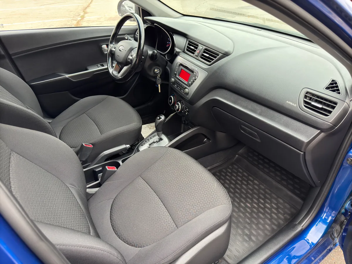 Kia Rio 1.4 AT (107 л.с.), 2014 — фото 7
