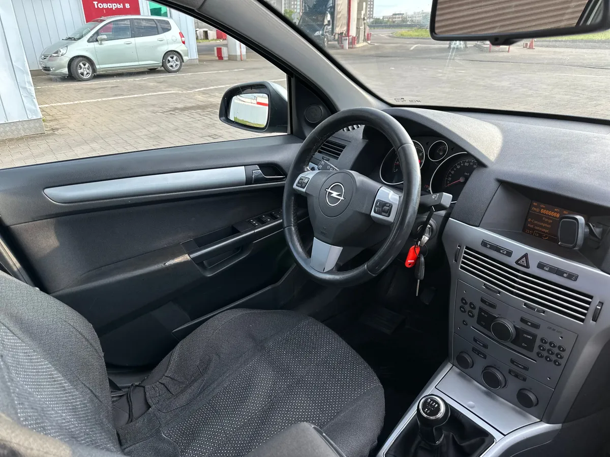 Opel Astra 1.6 MT (115 л.с.)