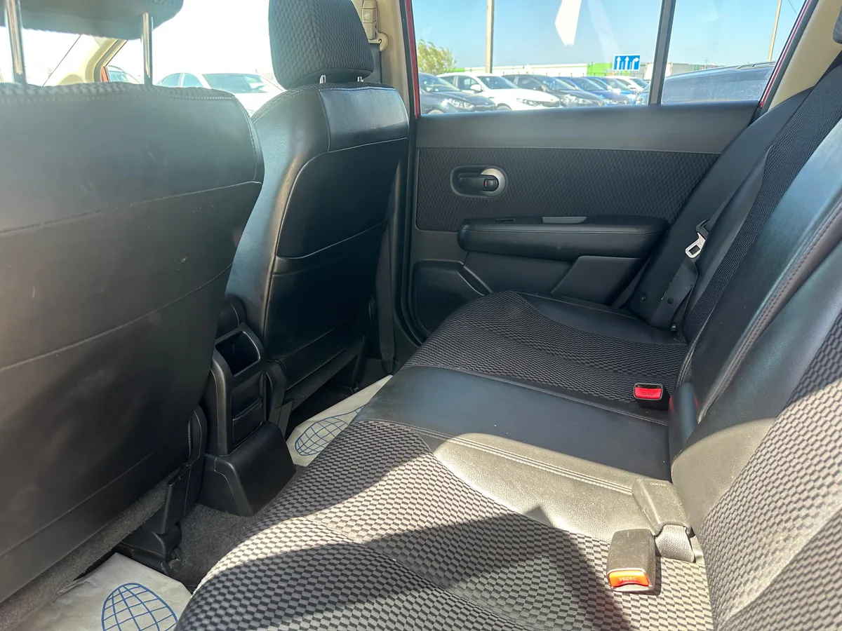 Nissan Tiida 1.6 AT (110 л.с.)