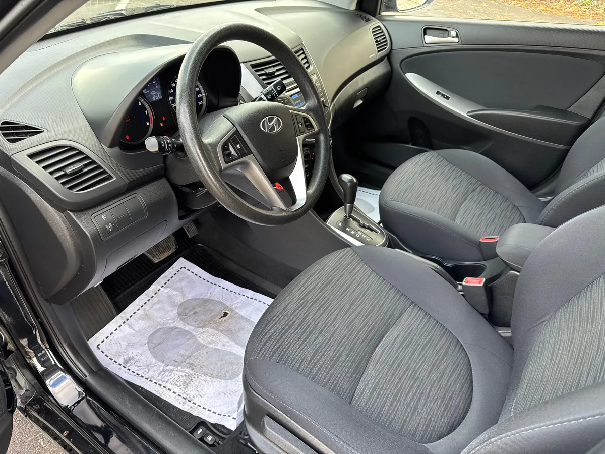 Hyundai Solaris 1.4 AT (107 л.с.), 2015 — фото 5