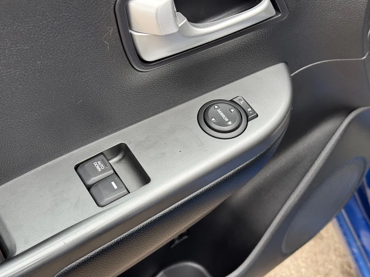 Kia Rio 1.4 AT (107 л.с.), 2014 — фото 11