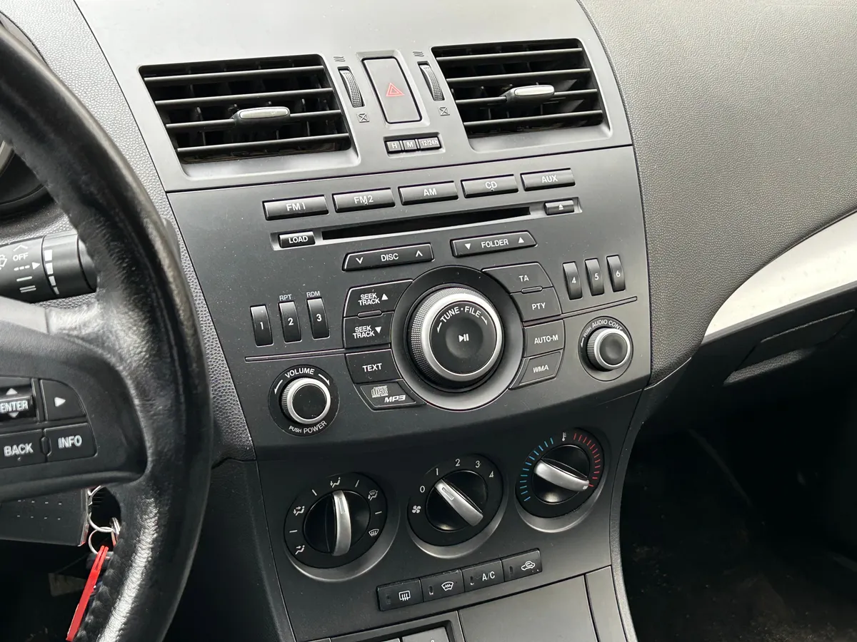 Mazda 3 1.6 AT (104 л.с.)