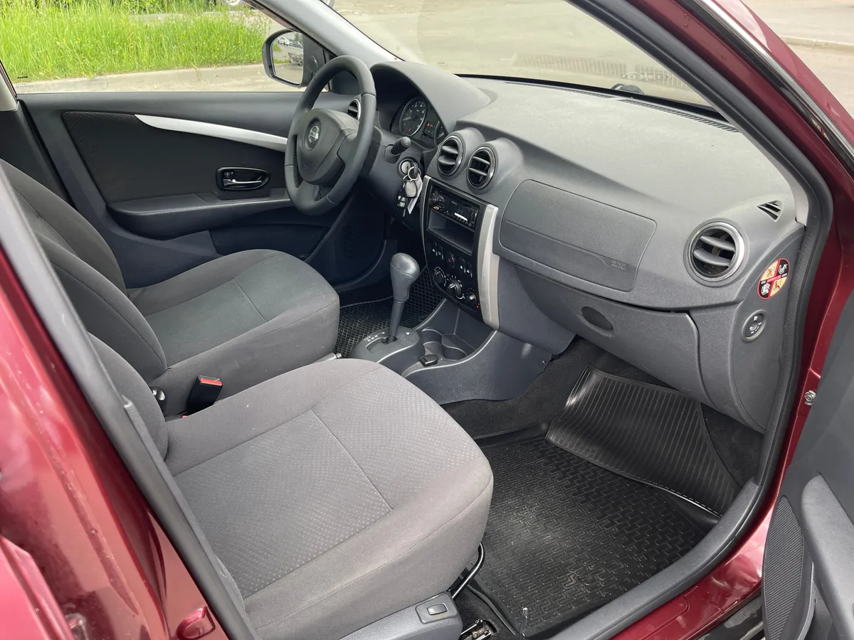Nissan Almera 1.6 AT (102 л.с.)