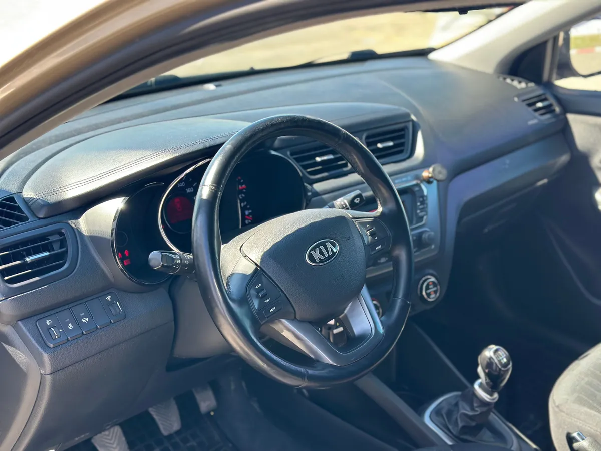 Kia Rio 1.6 MT (123 л.с.), 2013 — фото 7