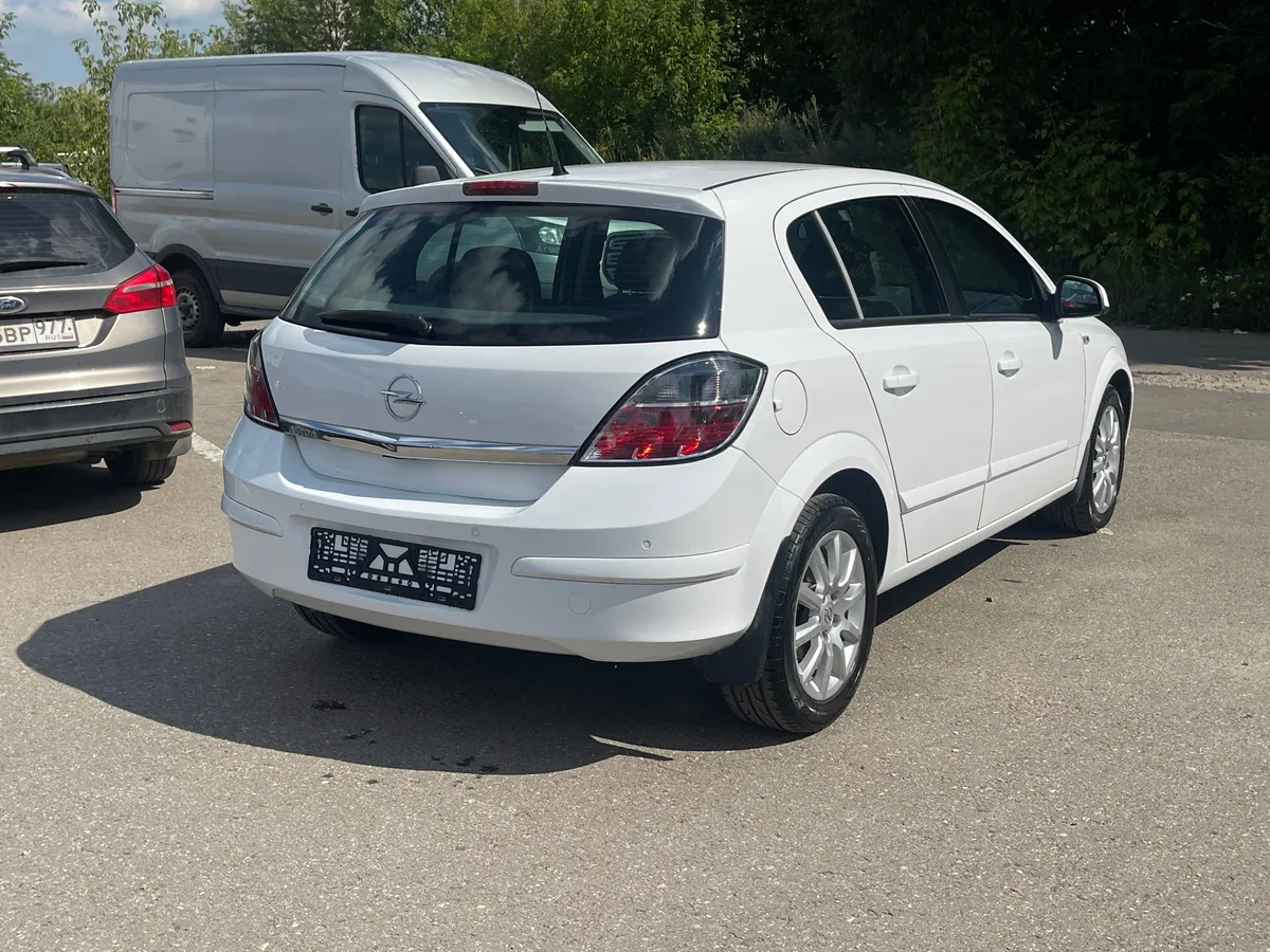 Opel Astra 1.8 AT (140 л.с.), 2012 — фото 4